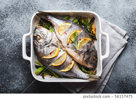 Fish dorado baked with asparagus Fish dorado baked with asparagus 56157475