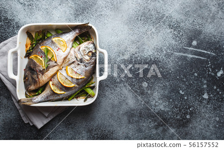 Fish dorado baked with asparagus Fish dorado baked with asparagus 56157552