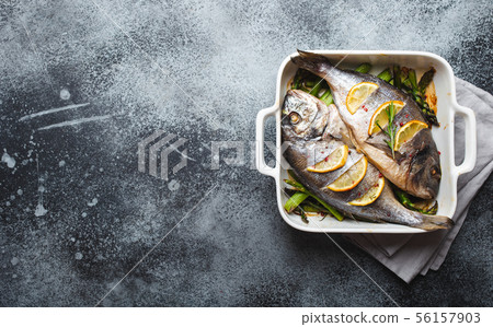 Fish dorado baked with asparagus Fish dorado baked with asparagus 56157903
