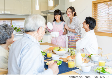 Three generations family meal 56169708