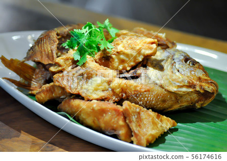 fried fish, fried tilapia fish 56174616
