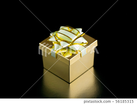 Gift on a black background. Gift on a black background. 56185315