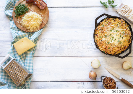 Cheese spaetzle and ingredients. German food Cheese spaetzle and ingredients. German food 56203052