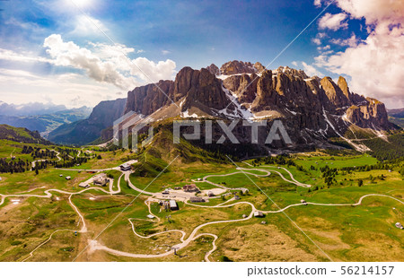 Aerial top view from drone to wonderful alpine landscape and meadows at Pass Gardena with majestic Aerial top view from drone to wonderful alpine landscape and meadows at Pass Gardena with majestic 56214157