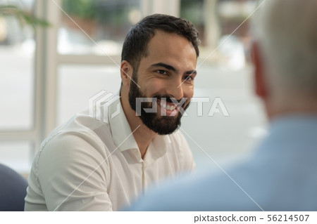 Portrait of handsome man that demonstrating his smile 56214507
