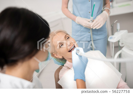 Woman being happy finally healing her teeth. Woman being happy finally healing her teeth. 56227758