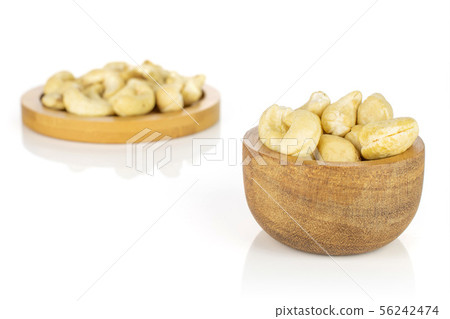 Raw unsalted cashew isolated on white Raw unsalted cashew isolated on white 56242474