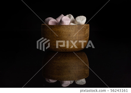 Sweet fluffy marshmallow isolated on black glass Sweet fluffy marshmallow isolated on black glass 56243161