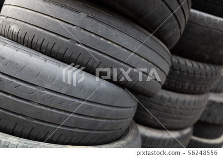 old used car tires stacked in piles 56248556