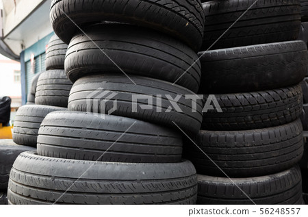 old used car tires stacked in piles 56248557