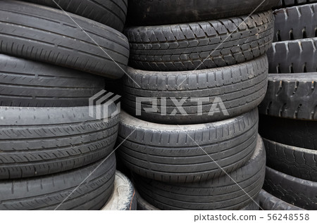old used car tires stacked in piles 56248558
