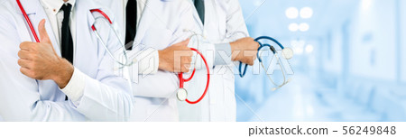 Doctor working in hospital with other doctors. Doctor working in hospital with other doctors. 56249848