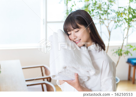 Young woman, laundry, towel, portrait, room 56250553