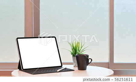 Mockup digital tablet, pencil and coffee on table. Mockup digital tablet, pencil and coffee on table. 56251611