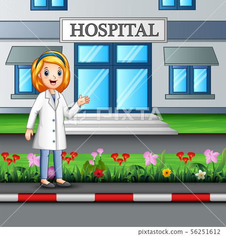 A nurse standing in front of hospital building 56251612