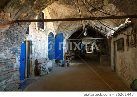 The spooky brick archway of an old abanoned building, nobody in the image The spooky brick archway of an old abanoned building, nobody in the image 56261443