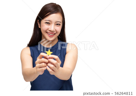 Happy Asian business woman showing star sign 56264811