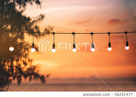 blurred bokeh light on sunset with yellow string blurred bokeh light on sunset with yellow string 56281477