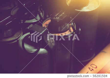 old hand grenades in box with dark background old hand grenades in box with dark background 56281504