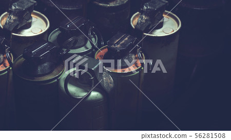 old hand grenades in box with dark background old hand grenades in box with dark background 56281508
