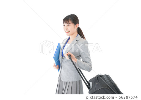 Young business woman going on a business trip Young business woman going on a business trip 56287574