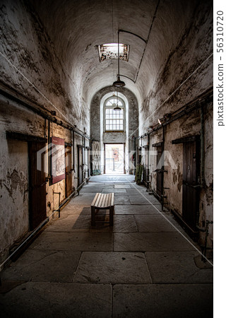 Prison corridor with cells on both sides Prison corridor with cells on both sides 56310720
