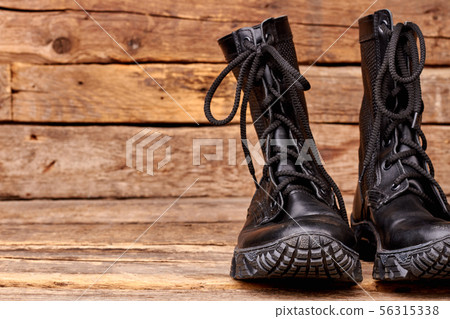 Close up pair of black boots. Close up pair of black boots. 56315338