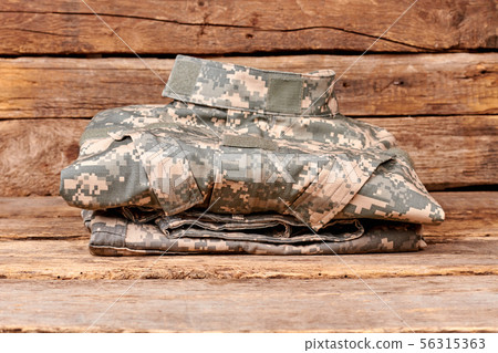 Folded military soldier outfit. Folded military soldier outfit. 56315363