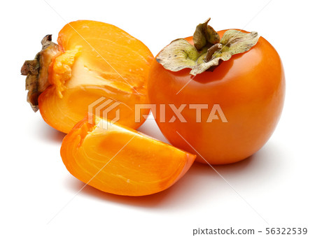 Whole and sliced ripe persimmon fruits isolated Whole and sliced ripe persimmon fruits isolated 56322539