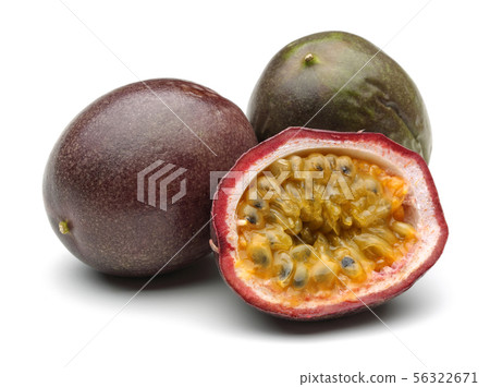 Whole and half passion fruits isolated on white 56322671