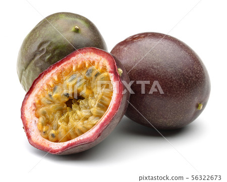 Whole and half passion fruits isolated on white 56322673