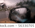 Rainy day car side mirror and water drop 56330705