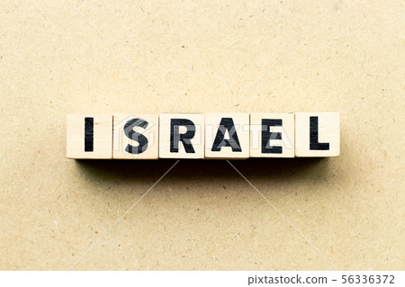 Letter block in word israel on wood background 56336372
