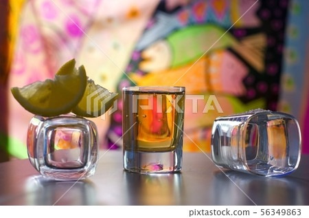 Mexican Tequila in Shot Glasses with Lime and Salt Mexican Tequila in Shot Glasses with Lime and Salt 56349863