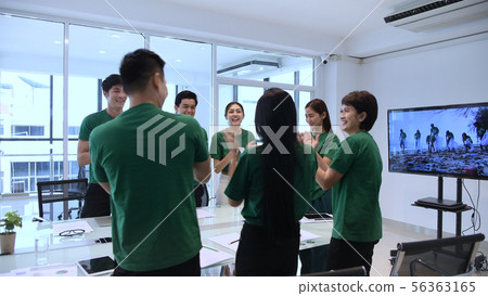 Conservation concept. Company employees are Conservation concept. Company employees are 56363165