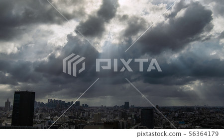 Tokyo cityscape in Japan Sunlight from the dark clouds and the valley of clouds 56364179