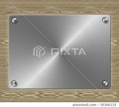 Metal plate on wooden background Metal plate on wooden background 56366218