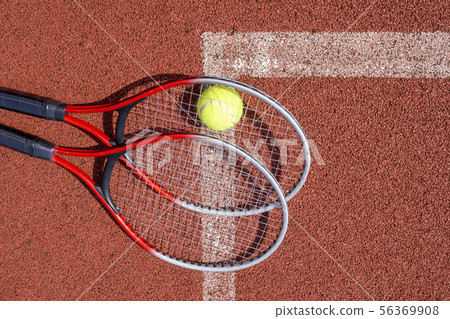 Top view tennis scene with ball and racquet 56369908