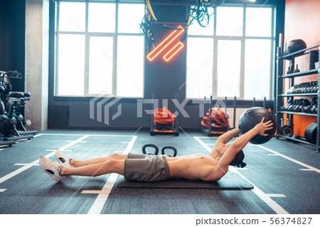 Nice strong man working on his muscles 56374827