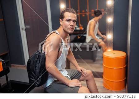 Attractive young man being ready to go 56377118