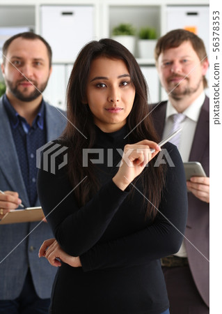 portrait of businesslady and two businessmen in office portrait of businesslady and two businessmen in office 56378353
