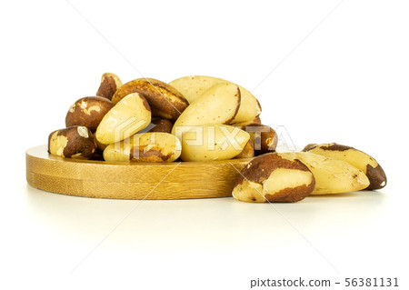 Unshelled brazil nut isolated on white Unshelled brazil nut isolated on white 56381131