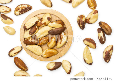 Unshelled brazil nut isolated on white Unshelled brazil nut isolated on white 56381179