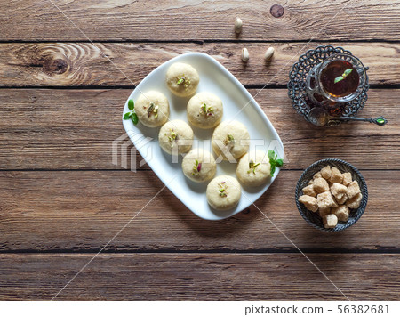 Peda (Indian sweet), Milk Fudge with tea cup 56382681