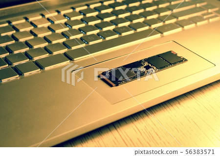 Chip SSD drive in the center of the laptop. Chip SSD drive in the center of the laptop. 56383571