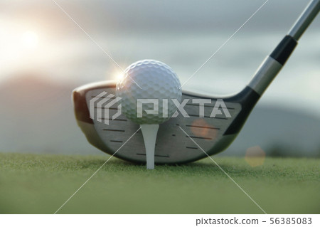 Golf ball and golf club in beautiful golf course a 56385083
