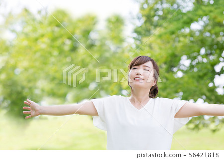 Business woman in fresh green Business woman in fresh green 56421818