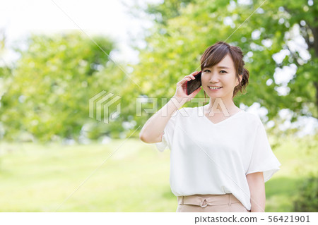 Business woman in fresh green Business woman in fresh green 56421901