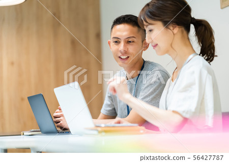 Business image Male employee Female employee 56427787