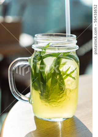 summer lemonade with tarragon and lemon 56438652